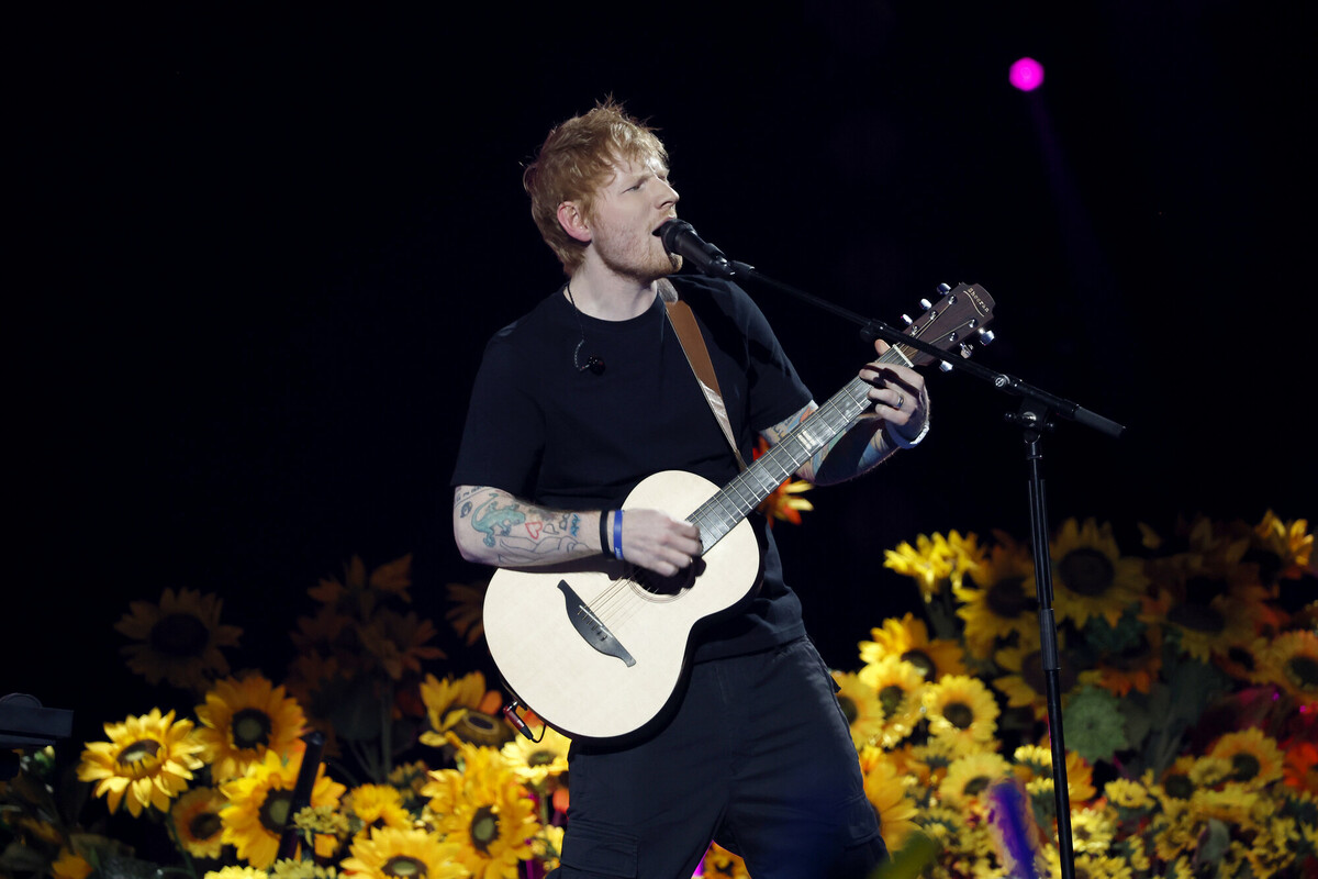 Ed Sheeran performs in front of a bank of sunflowers, Ukraine’s national flower, as part of Concert for Ukraine, broadcast live on ITV and STV. Image: John Phillips/DEC