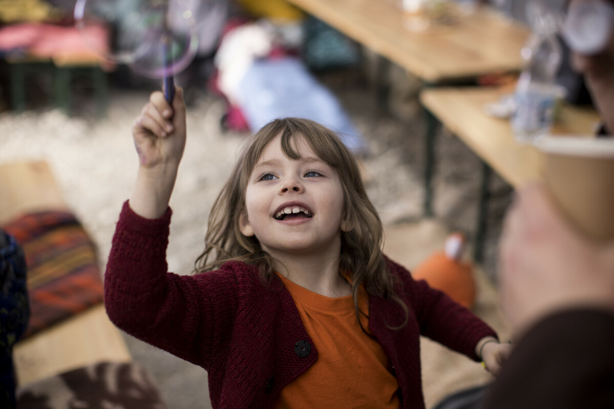 Lilia,* 6, plays in a tent run by Caritas providing food, hot drinks and support to refugees on Poland’s border with Ukraine in March 2022. Image: Toby Madden/DEC